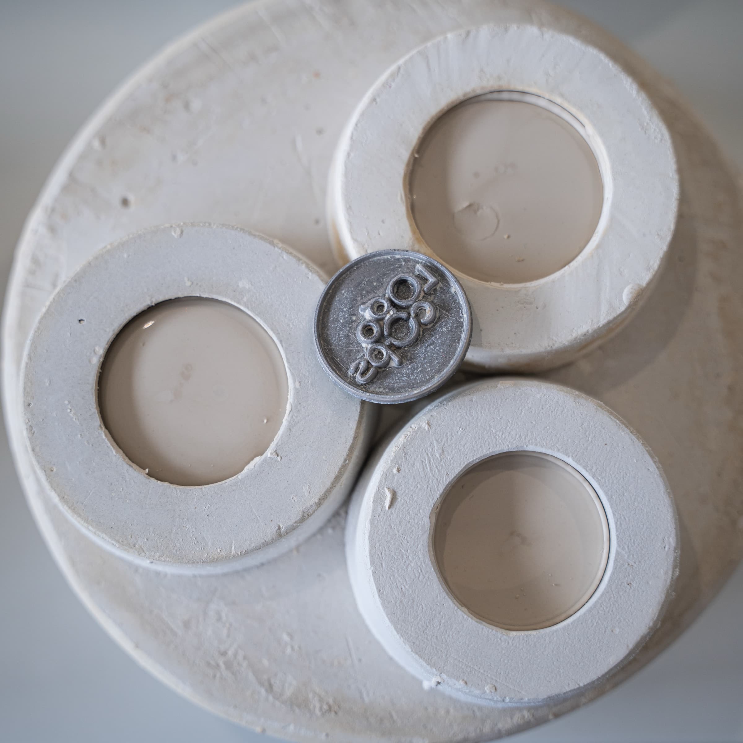 Cups on the workshop shelf